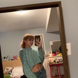cropped green sweater